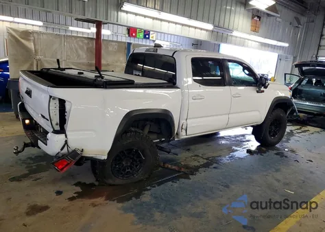 2021 Toyota Tacoma Double Cab z USA, uszkodzony, nr VIN 5TFCZ5AN0MX260440